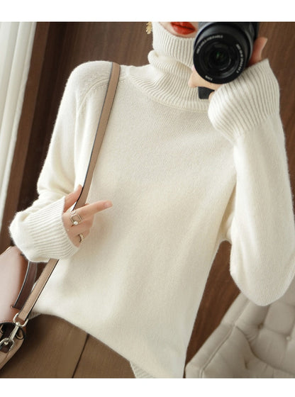 Sort rullekrave sweater i uld til kvinder