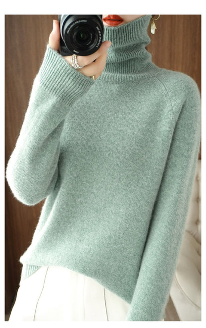 Sort rullekrave sweater i uld til kvinder