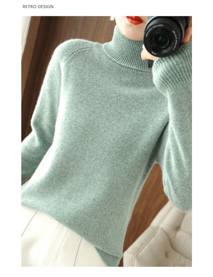 Sort rullekrave sweater i uld til kvinder