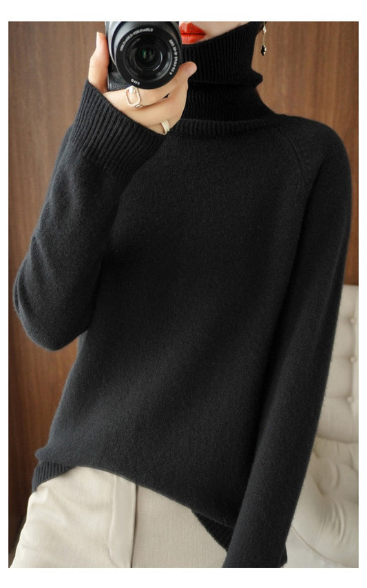 Sort rullekrave sweater i uld til kvinder